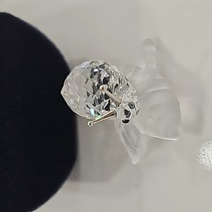 Swarovski snail on a vine leaf
